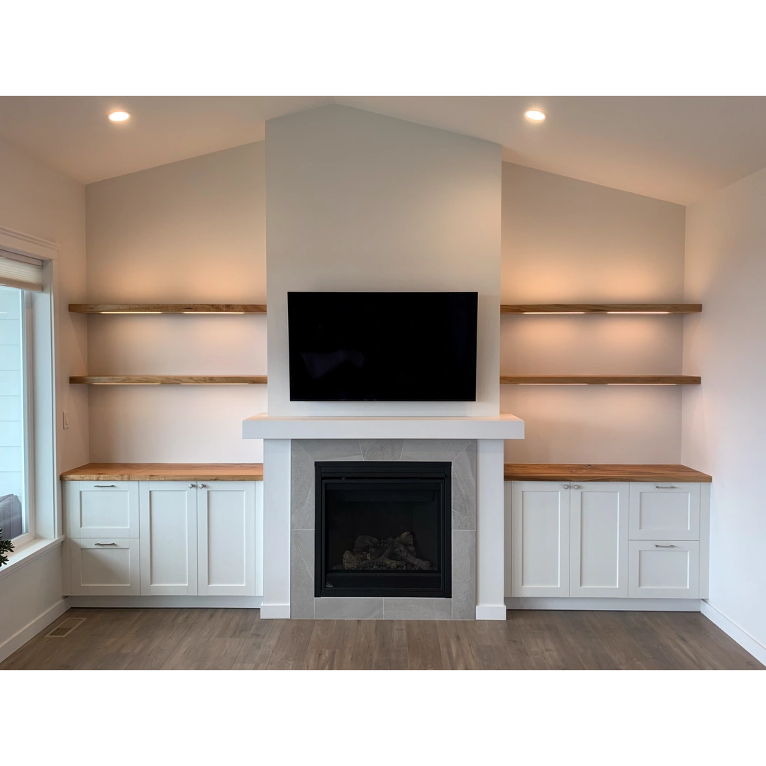 Built in cabinets with spalted maple countertops and shelves with integral lighting