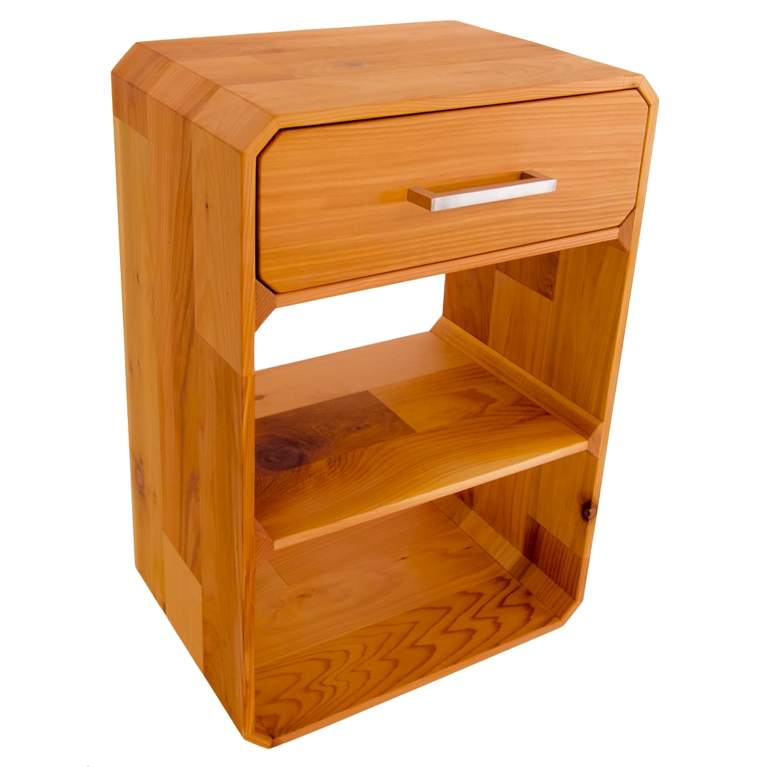 Modern night stand in laminated red cedar showing grain wrapping around the box